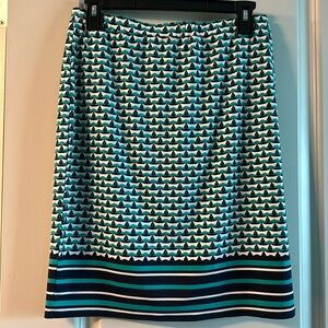 Blue, white and teal print skirt, about knee-length